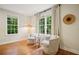 Bright sitting room with hardwood floors, comfortable seating, and large windows offering views at 78 Beverly Ne Rd, Atlanta, GA 30309