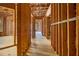 Unfinished basement featuring exposed framing and ceiling, offering potential for customization at 150 White Tail Ct, Fayetteville, GA 30214
