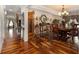 Dining room featuring a chandelier, hardwood floors, and a decorative area at 150 White Tail Ct, Fayetteville, GA 30214