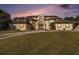 Grand estate showcasing impressive architecture and landscaping at 150 White Tail Ct, Fayetteville, GA 30214