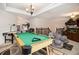Spacious game room equipped with a pool table, air hockey, and entertainment area at 150 White Tail Ct, Fayetteville, GA 30214