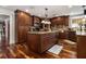 Gourmet kitchen featuring custom cabinetry, granite countertops, and stainless steel appliances at 150 White Tail Ct, Fayetteville, GA 30214