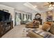 Inviting living room with neutral tones, plush seating, and a decorative fireplace at 150 White Tail Ct, Fayetteville, GA 30214
