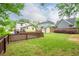 Green backyard with shed, deck, and wood fence at 354 Greenwood Ave, Decatur, GA 30030