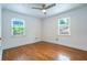 Bright bedroom with hardwood floors and two windows providing ample natural light at 354 Greenwood Ave, Decatur, GA 30030