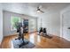 Home gym with hardwood floors, a ceiling fan, workout machines, and plenty of natural light at 354 Greenwood Ave, Decatur, GA 30030