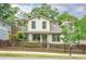 Charming two-story home with a picket fence and second story deck at 354 Greenwood Ave, Decatur, GA 30030