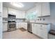 Modern kitchen with stainless steel appliances and lots of storage at 354 Greenwood Ave, Decatur, GA 30030