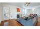 Bright living room with hardwood floors, fireplace, and ample seating at 354 Greenwood Ave, Decatur, GA 30030