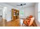 Inviting living room featuring hardwood floors and a classic bookcase at 354 Greenwood Ave, Decatur, GA 30030