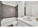 Cozy bathroom features a shower over tub, stylish fixtures, and modern vanity at 399 Tillman Pass, Woodstock, GA 30188
