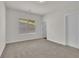 Bedroom with carpet flooring and a view from the window at 399 Tillman Pass, Woodstock, GA 30188