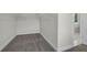 Walk-in closet with carpet flooring and bright walls at 399 Tillman Pass, Woodstock, GA 30188