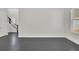 Unfurnished living room with wood floors, staircase, and natural light at 399 Tillman Pass, Woodstock, GA 30188