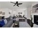 Spacious living room with fireplace and dining area, perfect for entertaining and relaxing at 399 Tillman Pass, Woodstock, GA 30188
