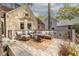 Spacious back deck offers ample seating, a coffee table, and seamless transition to outdoor relaxation and entertaining at 883 Wildwood Ne Rd, Atlanta, GA 30324