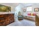 Bright bedroom with unique furnishings, artwork, and ample natural light at 883 Wildwood Ne Rd, Atlanta, GA 30324