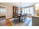 Sunlit dining room featuring hardwood floors, and backyard views at 883 Wildwood Ne Rd, Atlanta, GA 30324