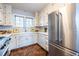 Well-lit kitchen featuring stainless steel appliances and ample counter space at 883 Wildwood Ne Rd, Atlanta, GA 30324