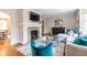 Comfortable living room with a stone fireplace, hardwood floors, and sophisticated decor at 883 Wildwood Ne Rd, Atlanta, GA 30324