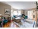 Bright living room showcasing hardwood floors, neutral paint, and access to the outdoors at 883 Wildwood Ne Rd, Atlanta, GA 30324