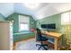Cozy office space with wood paneling, a built-in window seat, and ample lighting at 883 Wildwood Ne Rd, Atlanta, GA 30324