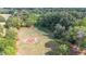 Verdant trees and open field space is revealed in this high angle shot, hinting at a secluded homesite at 85 Carroll Slough Rd, Kingston, GA 30145