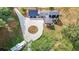 Aerial view shows a home with a circular drive and outdoor living space perfect for entertaining at 85 Carroll Slough Rd, Kingston, GA 30145