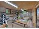 Finished basement area with windows, shelving, and cozy pet accommodations at 85 Carroll Slough Rd, Kingston, GA 30145