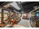 Finished basement featuring a recreational space, stairwell, and neutral-colored walls at 85 Carroll Slough Rd, Kingston, GA 30145