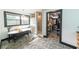 Bright bathroom featuring a clawfoot tub, walk-in shower, double vanity, and entrance to a walk-in closet at 85 Carroll Slough Rd, Kingston, GA 30145