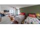Spacious bedroom with dark wood floors, 3 beds, and a ceiling fan at 85 Carroll Slough Rd, Kingston, GA 30145