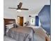Bedroom with a queen bed, and an accent wall at 85 Carroll Slough Rd, Kingston, GA 30145