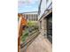 Exterior of a charming home with stone facade, wooden steps, and access to the screened-in porch at 85 Carroll Slough Rd, Kingston, GA 30145