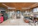 Spacious garage featuring unfinished walls, concrete floors and ample space for storage or workshop area at 85 Carroll Slough Rd, Kingston, GA 30145
