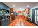 Spacious kitchen featuring wooden cabinets, stainless steel appliances, and hardwood floors at 85 Carroll Slough Rd, Kingston, GA 30145