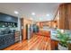 Bright kitchen with wooden cabinets, stainless steel appliances, and hardwood flooring at 85 Carroll Slough Rd, Kingston, GA 30145
