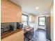 Modern laundry room with custom wood cabinetry, stainless steel appliances, and a sleek design at 85 Carroll Slough Rd, Kingston, GA 30145