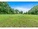 Picturesque lawn area, offering plenty of space and natural beauty at 85 Carroll Slough Rd, Kingston, GA 30145