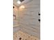 Luxurious shower with marble-like tile, a built-in bench, and modern fixtures at 85 Carroll Slough Rd, Kingston, GA 30145