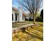 Backyard with patio and brick retaining wall at 2520 Legend Mill Run, Dacula, GA 30019