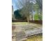Backyard patio with landscaping at 2520 Legend Mill Run, Dacula, GA 30019