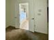 Bathroom doorway view features soaking tub and separate glass shower at 2520 Legend Mill Run, Dacula, GA 30019