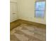 Bedroom with plush carpeting, window with blinds, and neutral paint at 2520 Legend Mill Run, Dacula, GA 30019