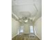 Primary bedroom ceiling with tray design, fan, and recessed lighting at 2520 Legend Mill Run, Dacula, GA 30019