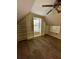 Spacious bedroom with a large window and built-in bookshelves for ample storage at 2520 Legend Mill Run, Dacula, GA 30019