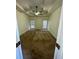 Spacious primary bedroom features tray ceiling, fan, and lots of natural light at 2520 Legend Mill Run, Dacula, GA 30019