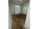 Bedroom with carpeted flooring, window with blinds, and neutral color walls at 2520 Legend Mill Run, Dacula, GA 30019