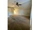 Spacious bonus room with neutral walls, a ceiling fan, and plush carpeting at 2520 Legend Mill Run, Dacula, GA 30019