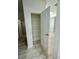 Pantry has wire shelves and a door to the rest of the house at 2520 Legend Mill Run, Dacula, GA 30019